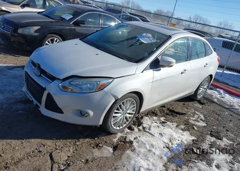 2012 Ford Focus Sel z USA, uszkodzony, nr VIN 1FAHP3H22CL288988